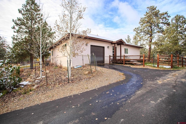 ranch-style house with a garage