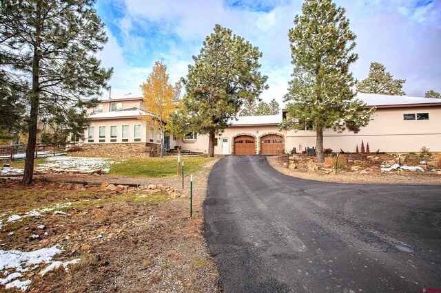 view of front of house with a garage