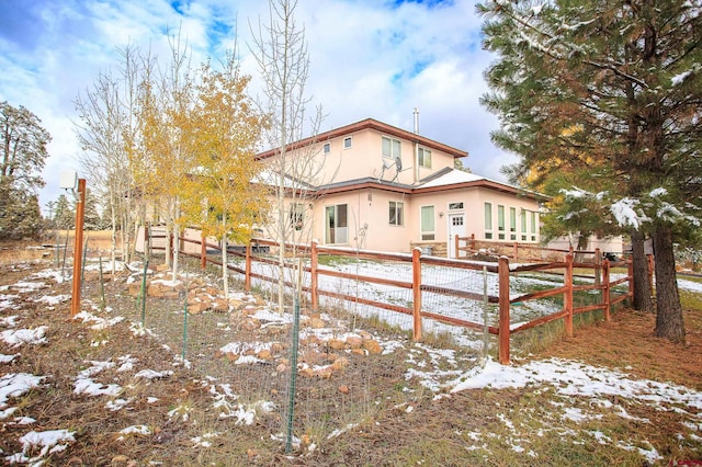 view of snow covered property