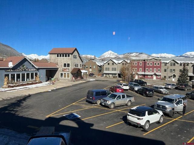 exterior space featuring a mountain view