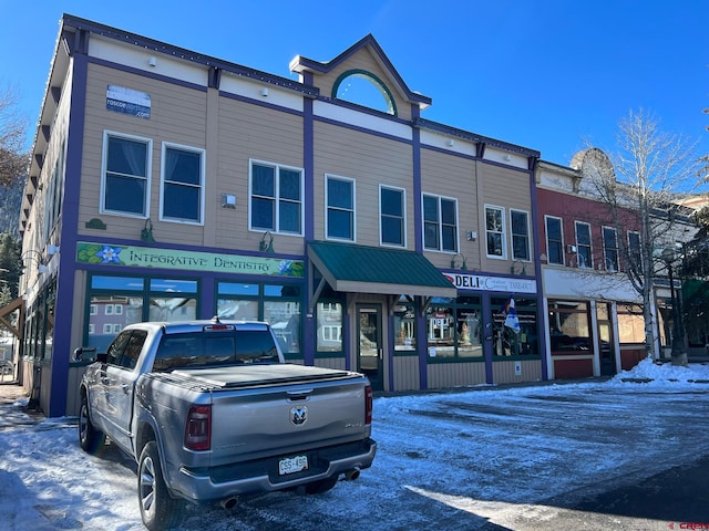 view of snow covered building