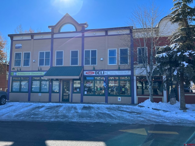 view of snow covered building