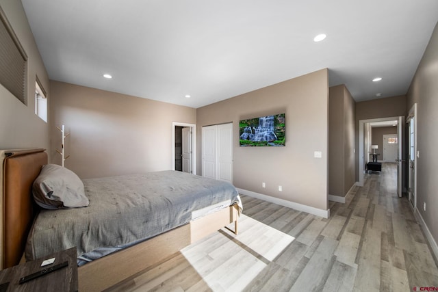 449 Birch St, Bayfield, CO 81122 - bedroom with light wood-style floors, baseboards, recessed lighting, and a closet