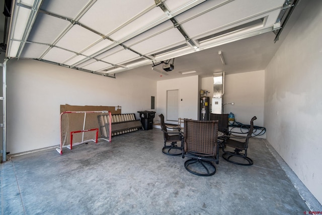 449 Birch St, Bayfield, CO 81122 - garage with a garage door opener and electric water heater
