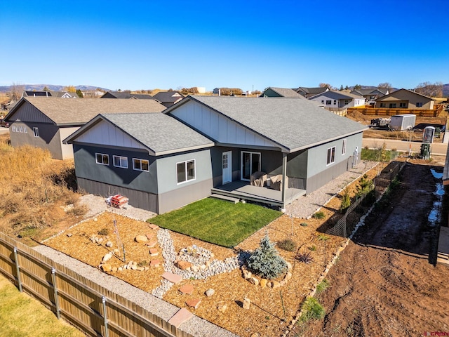 449 Birch St, Bayfield, CO 81122 - back of house with a shingled roof, a residential view, and board and batten siding