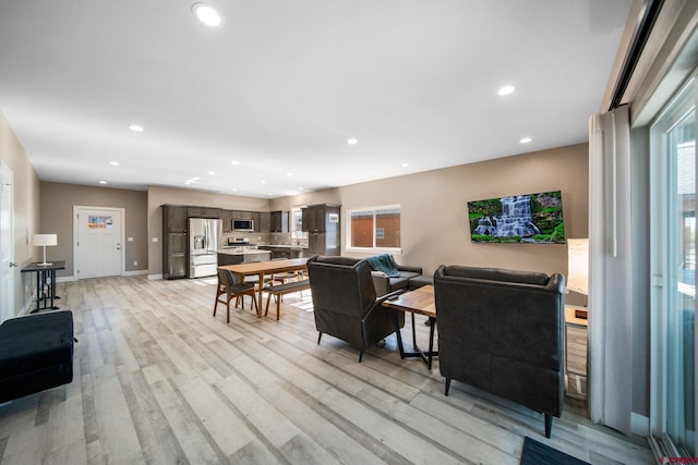 449 Birch St, Bayfield, CO 81122 - living area featuring light wood-type flooring, recessed lighting, and baseboards