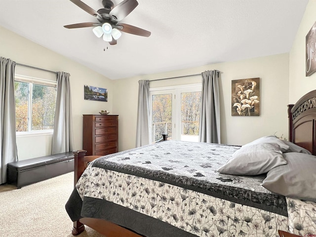 carpeted bedroom featuring ceiling fan and lofted ceiling