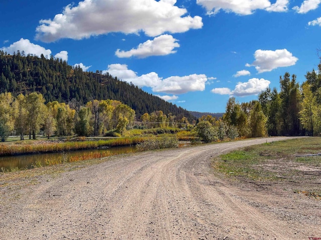 view of road featuring a water view