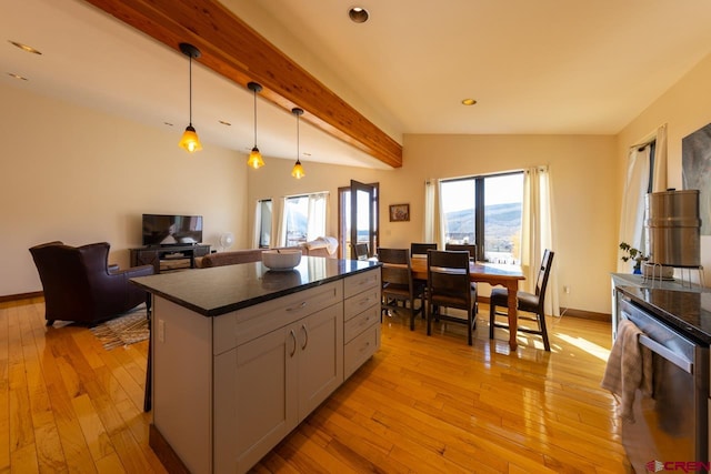 kitchen with light hardwood / wood-style flooring, gray cabinetry, vaulted ceiling with beams, hanging light fixtures, and stainless steel dishwasher