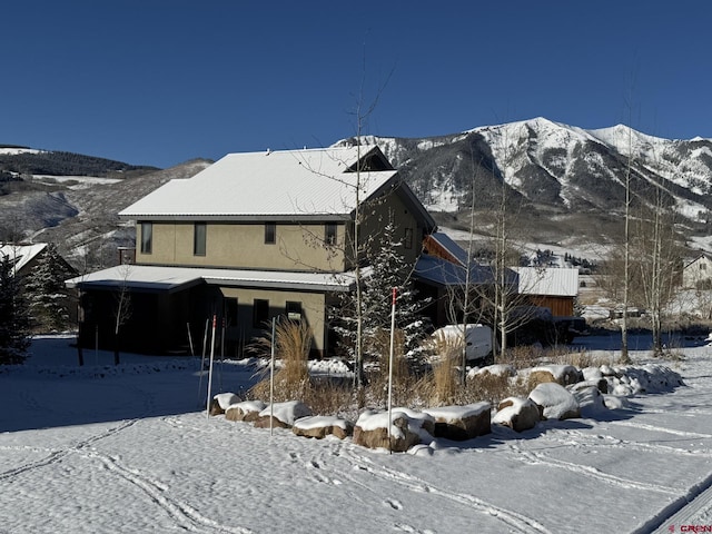 exterior space featuring a mountain view