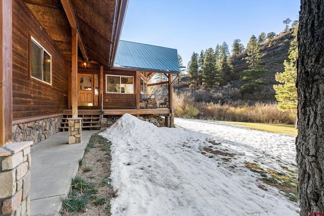 view of yard with covered porch