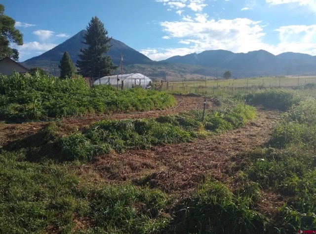 view of mountain feature featuring a rural view