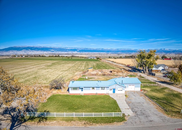 bird's eye view with a mountain view and a rural view