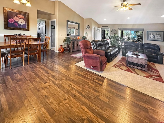 living room featuring wood-type flooring, high vaulted ceiling, and ceiling fan