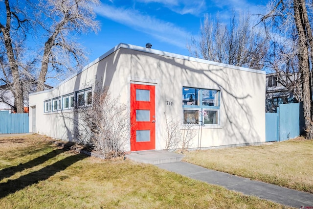 exterior space with a front yard