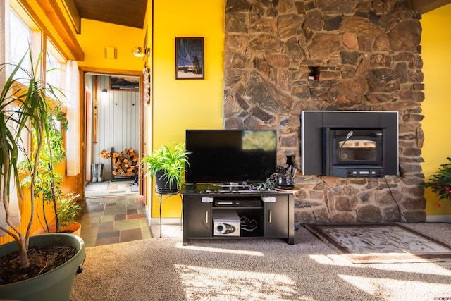 living room with carpet flooring and lofted ceiling