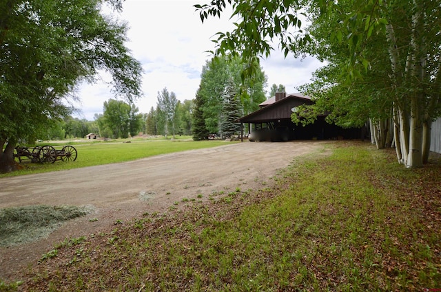 view of yard featuring a carport