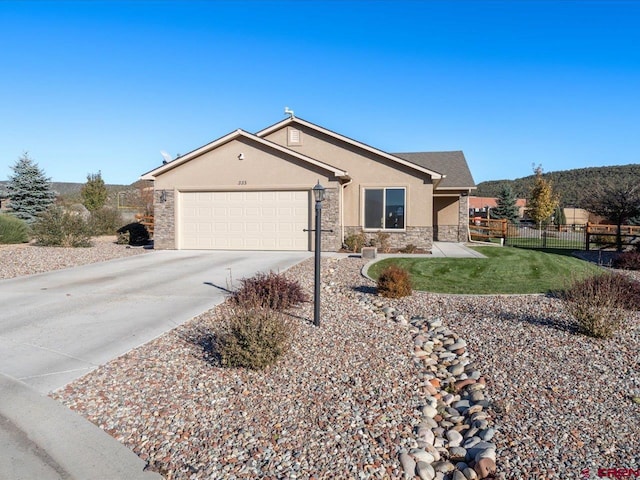 ranch-style home featuring a garage