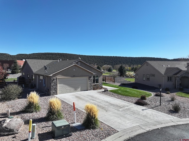 single story home with a garage