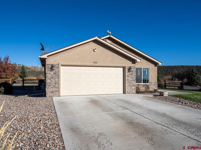 ranch-style home with a garage