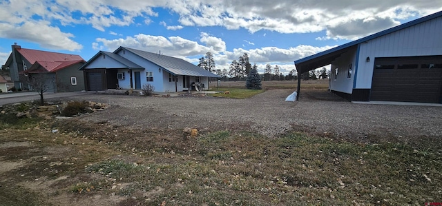 view of side of property with a garage