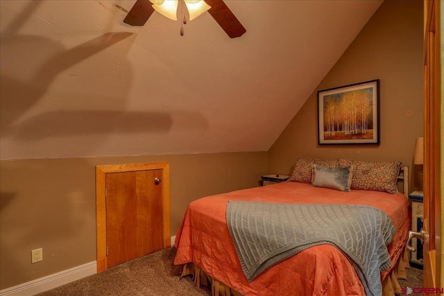 carpeted bedroom featuring ceiling fan and lofted ceiling