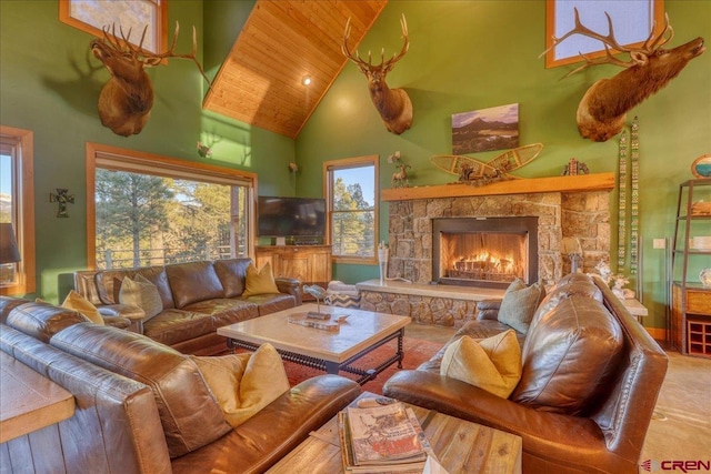 living room featuring a stone fireplace, high vaulted ceiling, and wooden ceiling