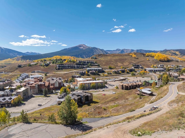 drone / aerial view featuring a mountain view