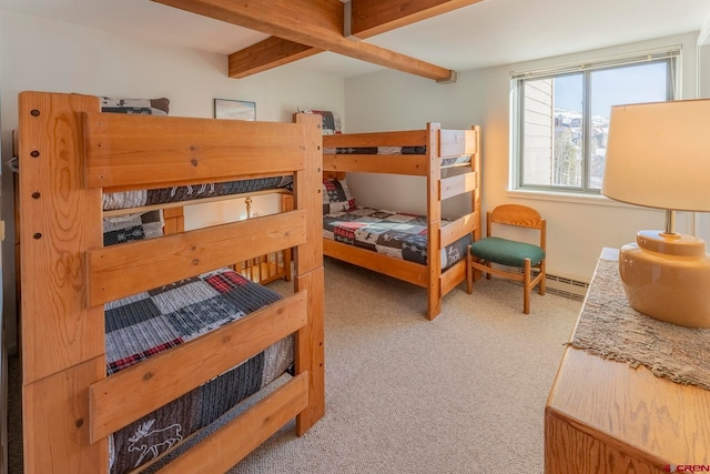 carpeted bedroom with beam ceiling