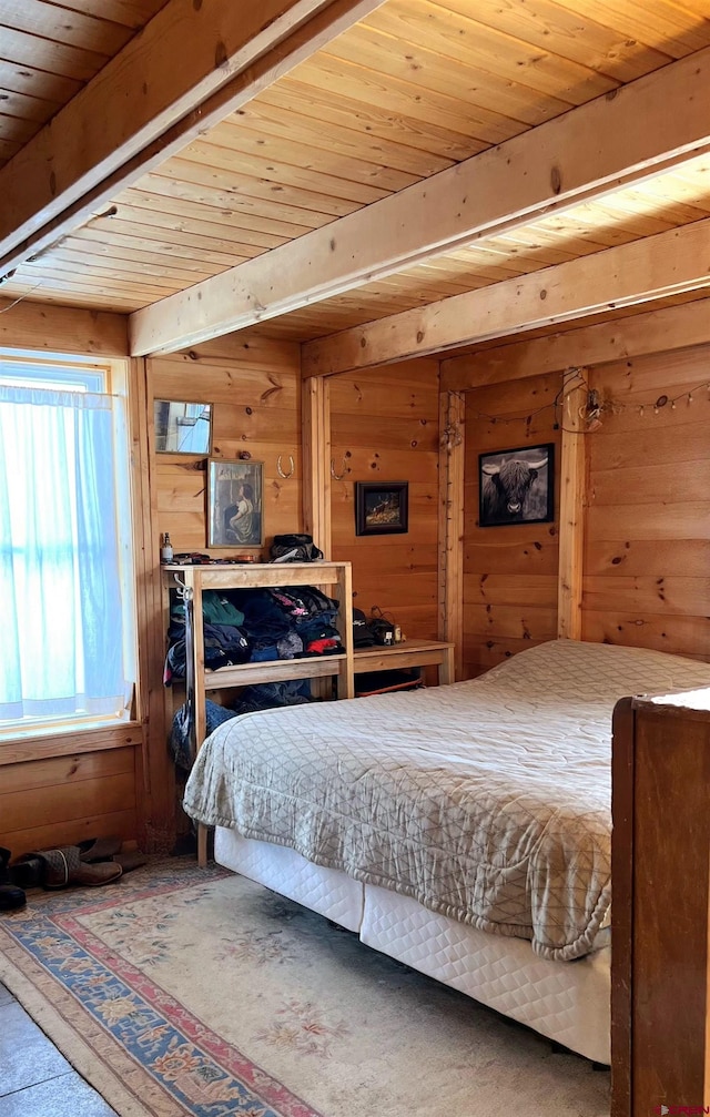 bedroom featuring wooden walls, beamed ceiling, and wood ceiling