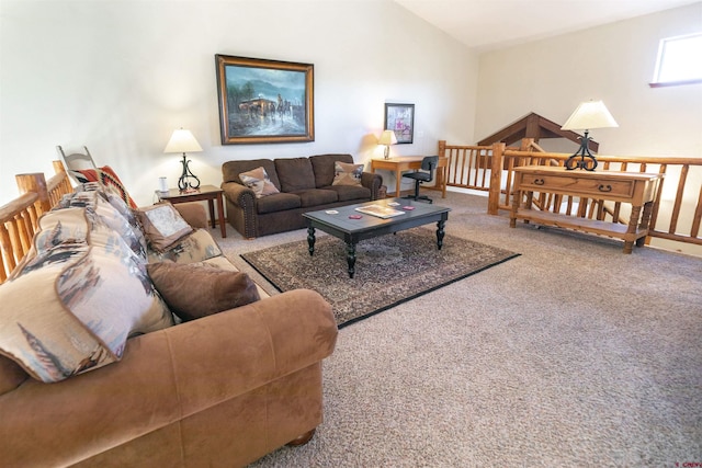 carpeted living room featuring vaulted ceiling