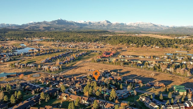 aerial view with a water and mountain view