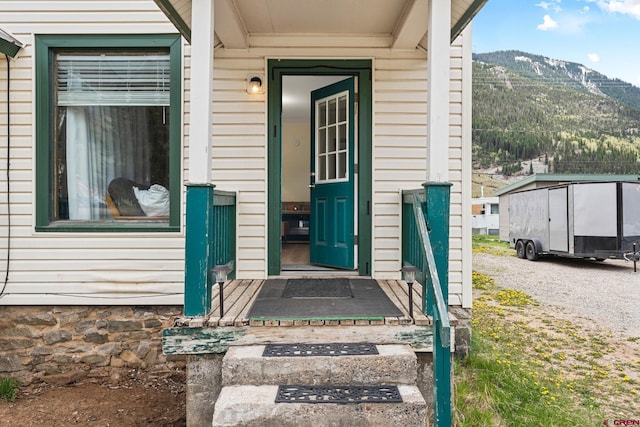 entrance to property with a mountain view