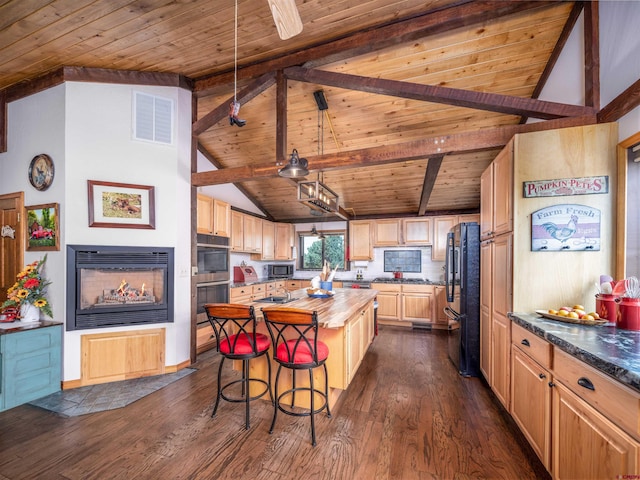 kitchen featuring appliances with stainless steel finishes, a center island, dark hardwood / wood-style floors, and wood ceiling