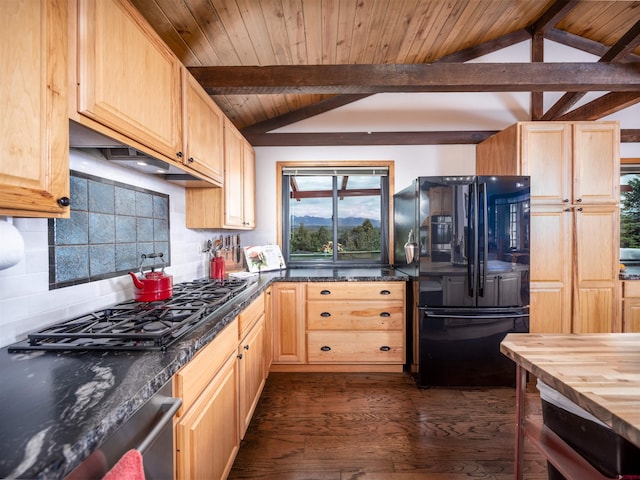 kitchen with lofted ceiling with beams, light brown cabinets, black fridge, and dark wood-type flooring