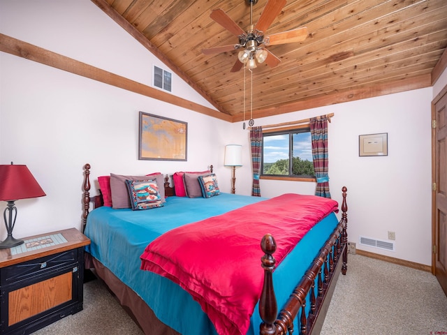 carpeted bedroom with ceiling fan, wood ceiling, and vaulted ceiling