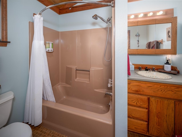 full bathroom with vanity, shower / bath combo, and toilet