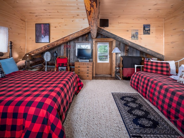 bedroom with vaulted ceiling with beams, wooden walls, and wooden ceiling