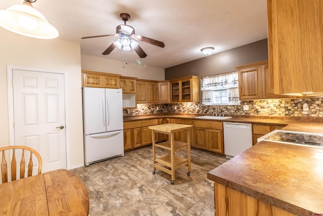 kitchen with decorative backsplash, a textured ceiling, white appliances, ceiling fan, and pendant lighting