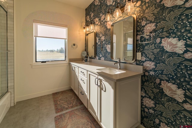 bathroom featuring tile patterned flooring, vanity, and shower / washtub combination