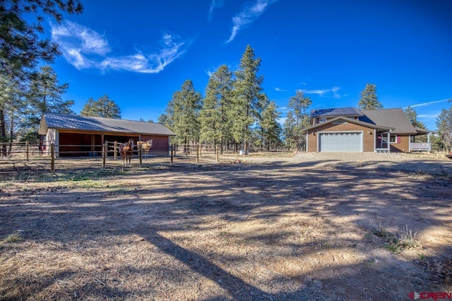 view of front of house with an outdoor structure