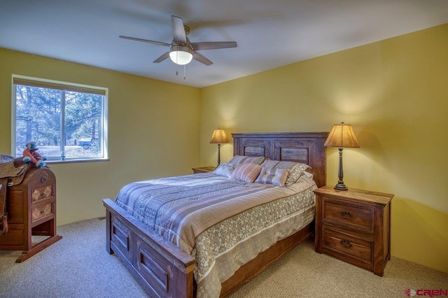 bedroom with light colored carpet and ceiling fan