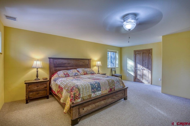 carpeted bedroom featuring ceiling fan