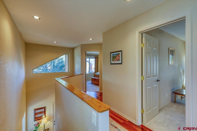 hall with light hardwood / wood-style floors