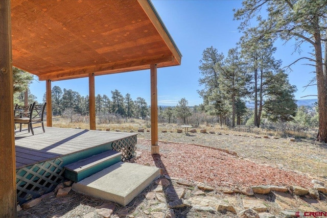 exterior space featuring a wooden deck