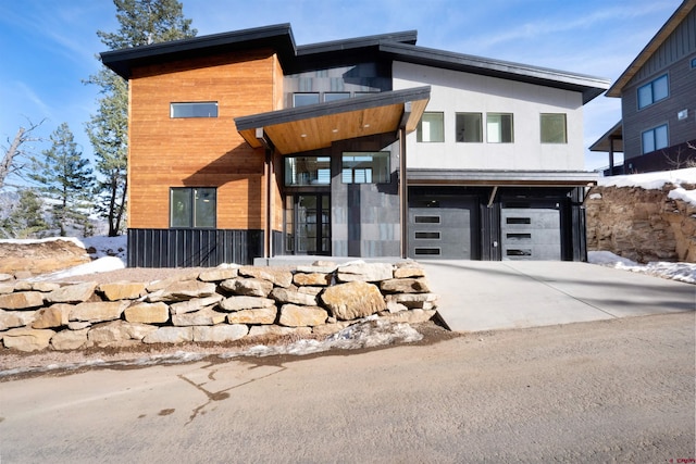 contemporary house featuring a garage