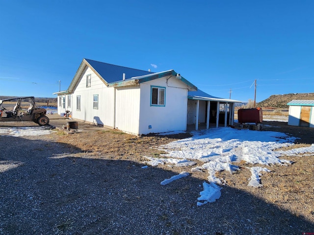 view of snow covered property