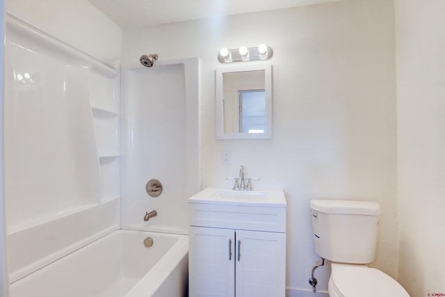 full bathroom featuring toilet, bathing tub / shower combination, and vanity