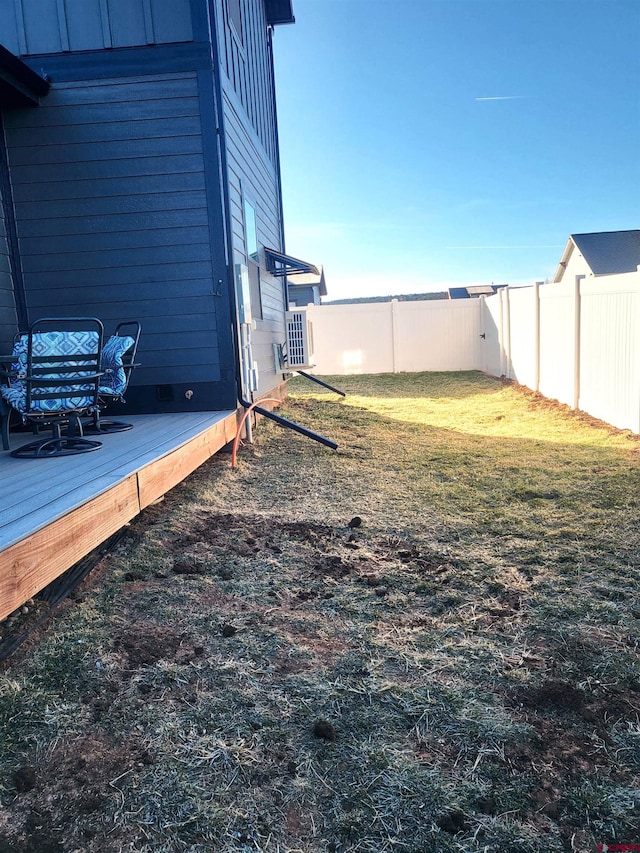 view of yard featuring a wooden deck