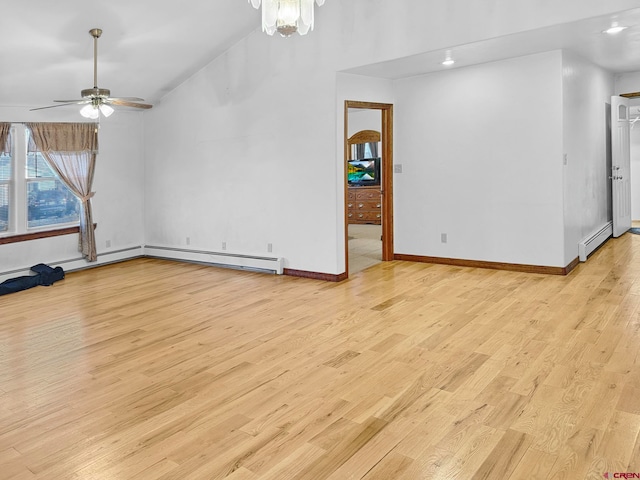 unfurnished living room featuring baseboard heating, ceiling fan, and light hardwood / wood-style floors